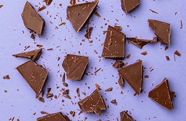 Image of chocolate on a purple background