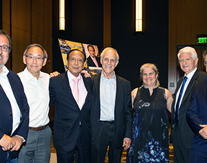 Group image of Miguel García-Garibay, dean of the UCLA Division of Physical Sciences; Steven Chu, Stanford’s William R. Kenan Jr. Professor of Physics and Professor of Molecular and Cellular Physiology, winner of the 1997 Nobel Prize in Physics and U.S. Secretary of Energy from 2009-2013; Mani L. Bhaumik, Institute founder, physicist and philanthropist; David Gross, UCSB’s Chancellor’s Chair Professor of Theoretical Physics at the Kavli Institute for Theoretical Physics and winner of the 2004 Nobel Prize in Physics; Andrea Ghez, UCLA's Lauren B. Leichtman & Arthur E. Levine Chair in Astrophysics and winner of the 2020 Nobel Prize in Physics; Gene D. Block, UCLA Chancellor; and Zvi Bern, director of the Mani L. Bhaumik Institute.