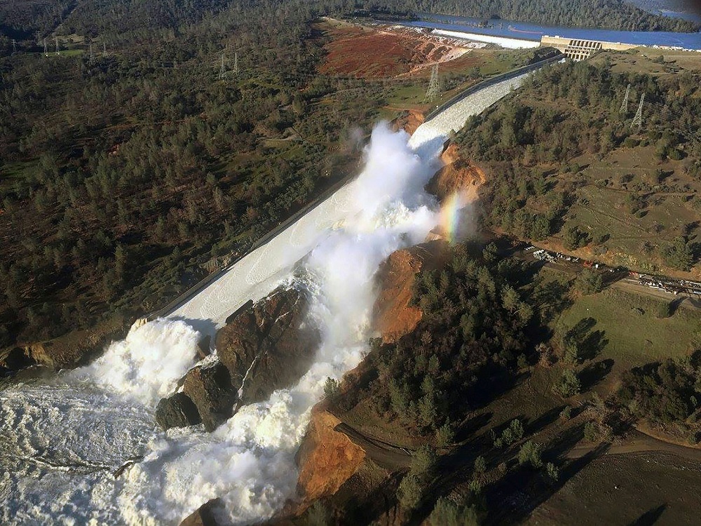 Image of Flood waters surging over the Oroville Dam spillway in California and damaging the surrounding channel on Feb. 11, 2017.
