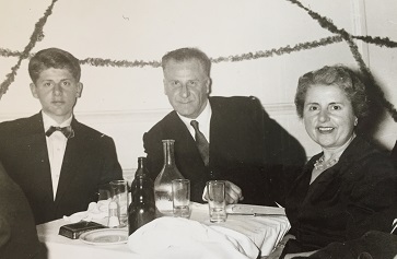 Image of three people sitting at a table