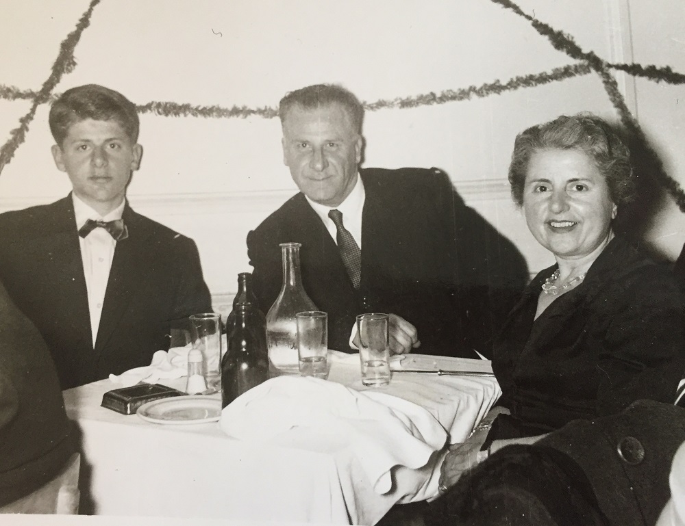 Image of three people sitting at a table