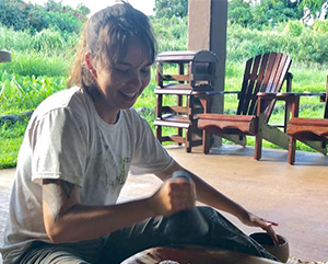 Danielle Kalani Heinz making poi in Hawaii