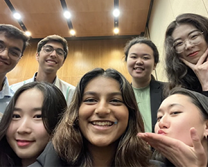 MedalUp team selfie, including seven team members