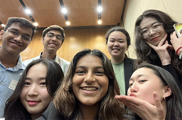 MedalUp team selfie, including seven team members