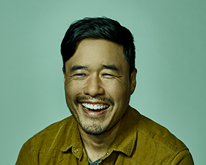 Head and shoulders photo of Randall Park against a green background.