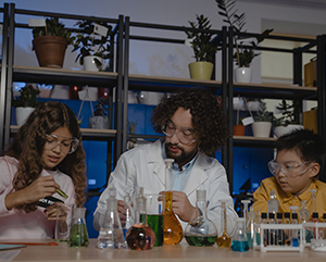 Teacher in science lab with students