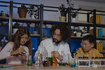 Teacher in science lab with students