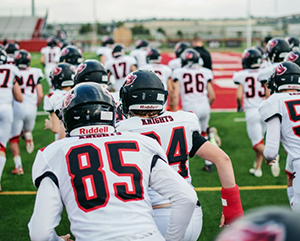 Football-363-241 Football team running onto the field