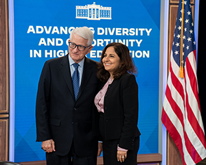 Chancellor Block and White House domestic policy advisor Neera Tanden in front of “Advancing Diversity” sign at White House