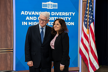 Chancellor Block and White House domestic policy advisor Neera Tanden in front of “Advancing Diversity” sign at White House