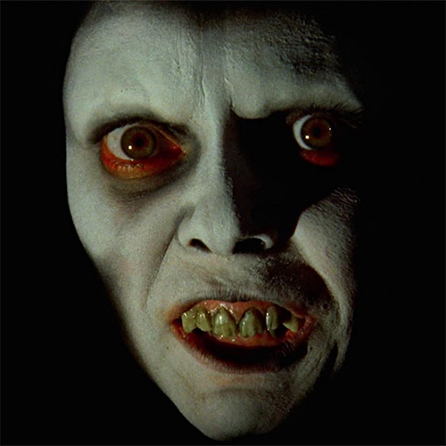 close-up image of a scary figure with pale skin