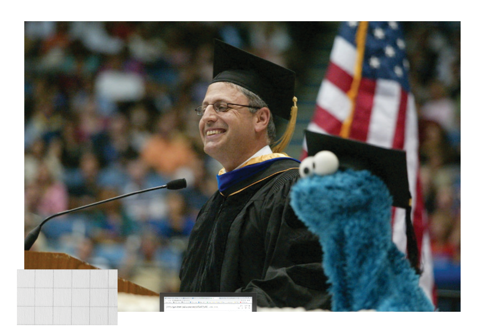 2005 UCLA College Commencement speaker, Gary Knell '75 with Sesame Street's Cookie Monster on stage for a special appearance before the Pauley Pavilion crowd.