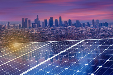 A solar panel with the city of Los Angeles in the background, a purple sky populates the horizon.