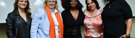 From left to right: Guylaine Maroist, Sarah T. Roberts, Kiah Morris, Kristy Guevara-Flanagan, Safiya Noble stand in front of screen featuring “Backlash: Misogyny in the Digital Age”