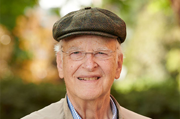 Peter Narins, wearing a cap and vest