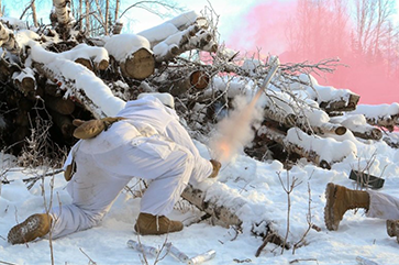 Nam Yong Chu in white combat outfit in wilderness and snow shooting off rocket