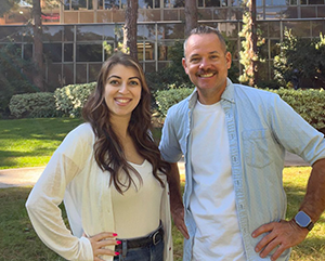 Mariam Janvelyan, left, Benjamin Lewis standing outside