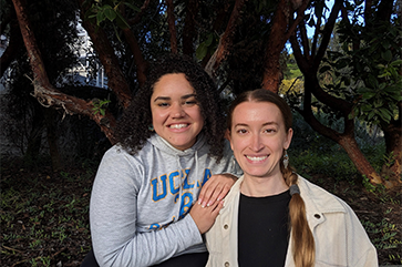 Makayla Rawlins, left, in UCLA hoodie and Cheyenne Caraway in black and white