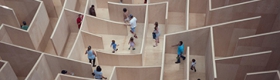 People walk through maze