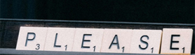 Scrabble-like tiles spell out the word “please.”