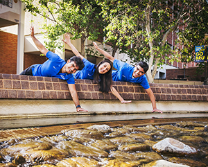 Bruin-Tour-Guides-363-241 Bruin tour guides Marcus Aurelius, Sierra Benayon-Abraham and Sanketh Santhosh smiling — but not touching! — at the famed Inverted Fountain