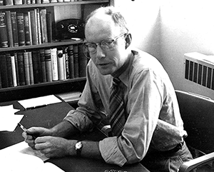 Daniel+Atkinson-363-241 A black and white photograph of Professor Daniel Atkinson in his Haines Hall office in 1952.