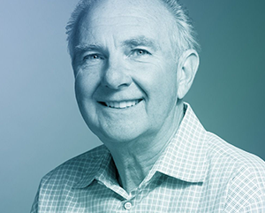 david+placek_363-241 A head and shoulders photograph of David Placek treated with a blue gradient tint.