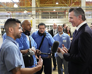 life-sciences-newsom-new-ca-law-363-241 Gov. Gavin Newsom speaking to inmates at San Quentin last year. His administration opposed heat standards for prisons.