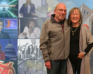 Drasnin+363-241 Irv Drasnin and Xiaoyan Zhao Drasnin against a collage of news broadcast screenshots and Royce Hall.