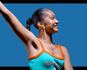 Afro-Latino-bruins-363-241 Jasmine Aner against a blue background