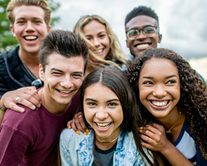 Center+for+the+Developing+Adolescent-363-241 Six adolescents smiling for the camera