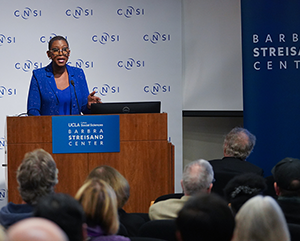 Michele-Bratcher-Goodwin-363-241 Michele Bratcher Goodwin speaking at podium