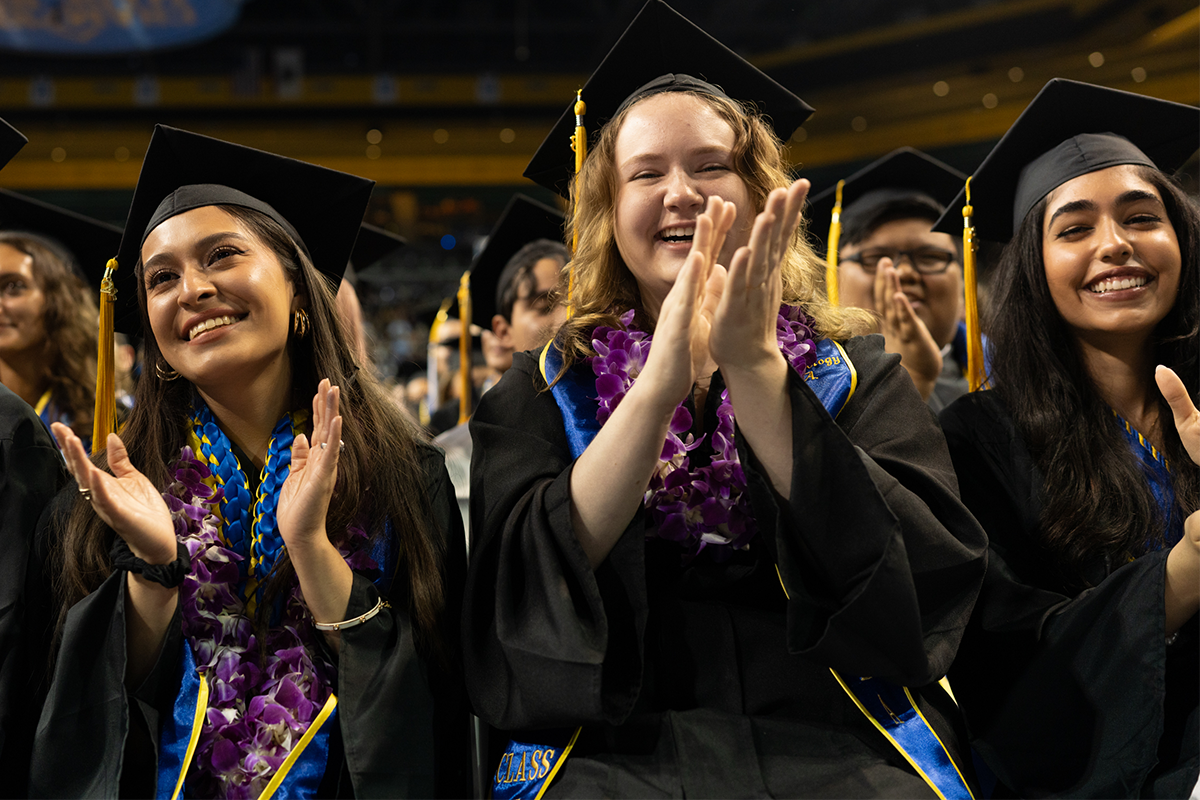 Members of class of 2023 applauding at UCLA College commencement