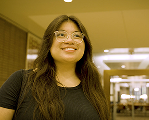 Evelyn-363-241 Head-and-shoulderss photo of Evelyn Giron in black top and glasses