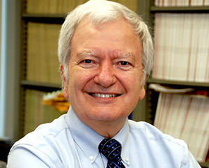 Michael-Jung-363-241 Head-and-shoulders photo of Michael Jung in light blue button-down and dark blue tie