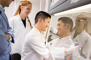 researchers in lab coats