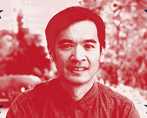 Stylized red-toned portrait of Terence Tao with short dark hair wearing a button-up shirt, set against a blurred outdoor background with foliage and buildings. Four dark blue stars frame the corners, giving the image a graphic, poster-like appearance.
