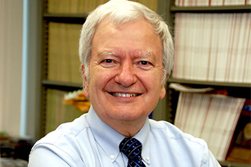 Head-and-shoulders photo of Michael Jung in light blue button-down and dark blue tie