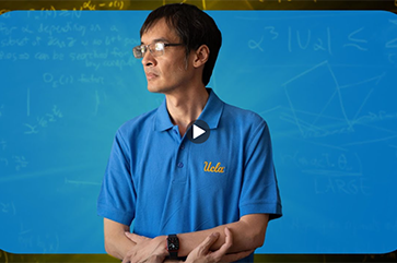 Terence Tao against a blue background.