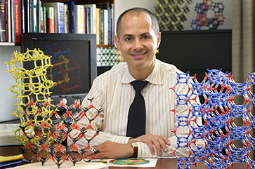 Yaghi with structural models of his MOFs at UCLA.