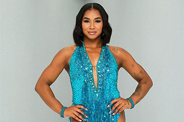 Jordan Chiles wearing teal blue outfit and matching bracelets for “Dancing With the Stars” cast photo