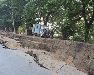 An image of the earth split open following an earthquake