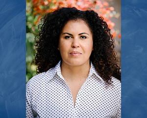 Safiya Noble in white top with black polka dots