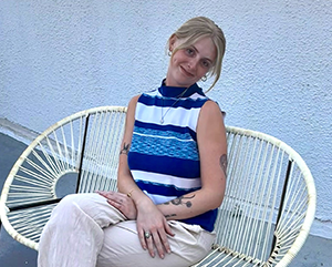 Portrait of Brinn Wallin seated