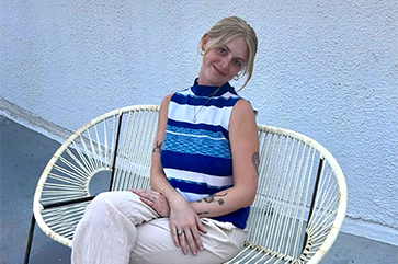 Portrait of Brinn Wallin seated