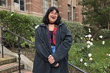 Nat Escobedo on the steps outside of Kaplan Hall