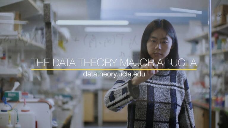 A person writes on a transparent board in a laboratory setting. Text over the image reads The Data Theory Major at UCLA and datatheory.ucla.edu.