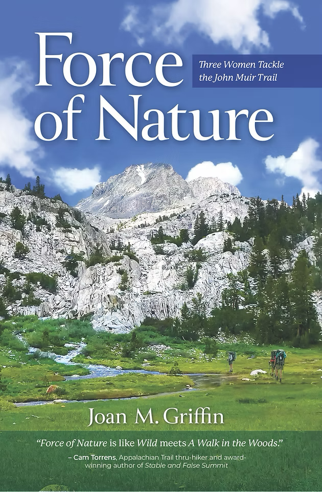 Book cover for Force of Nature by Joan M. Griffin, featuring a scenic mountain landscape with snow-capped peaks, rocky slopes, green meadow, and a clear blue sky with clouds.