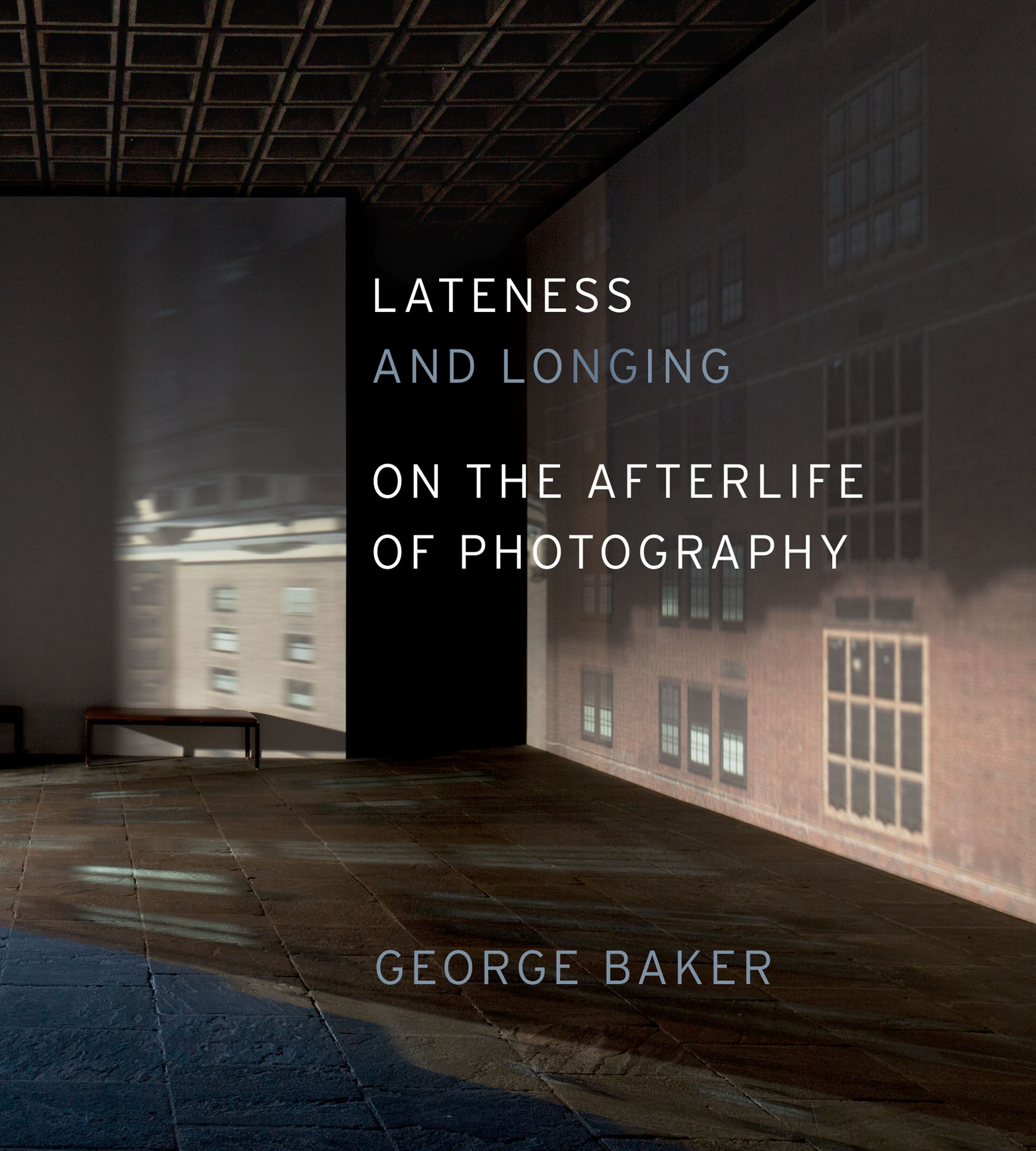 A book cover for Lateness and Longing: On the Afterlife of Photography by George Baker, featuring a dimly lit room with window reflections and text overlaying the image.